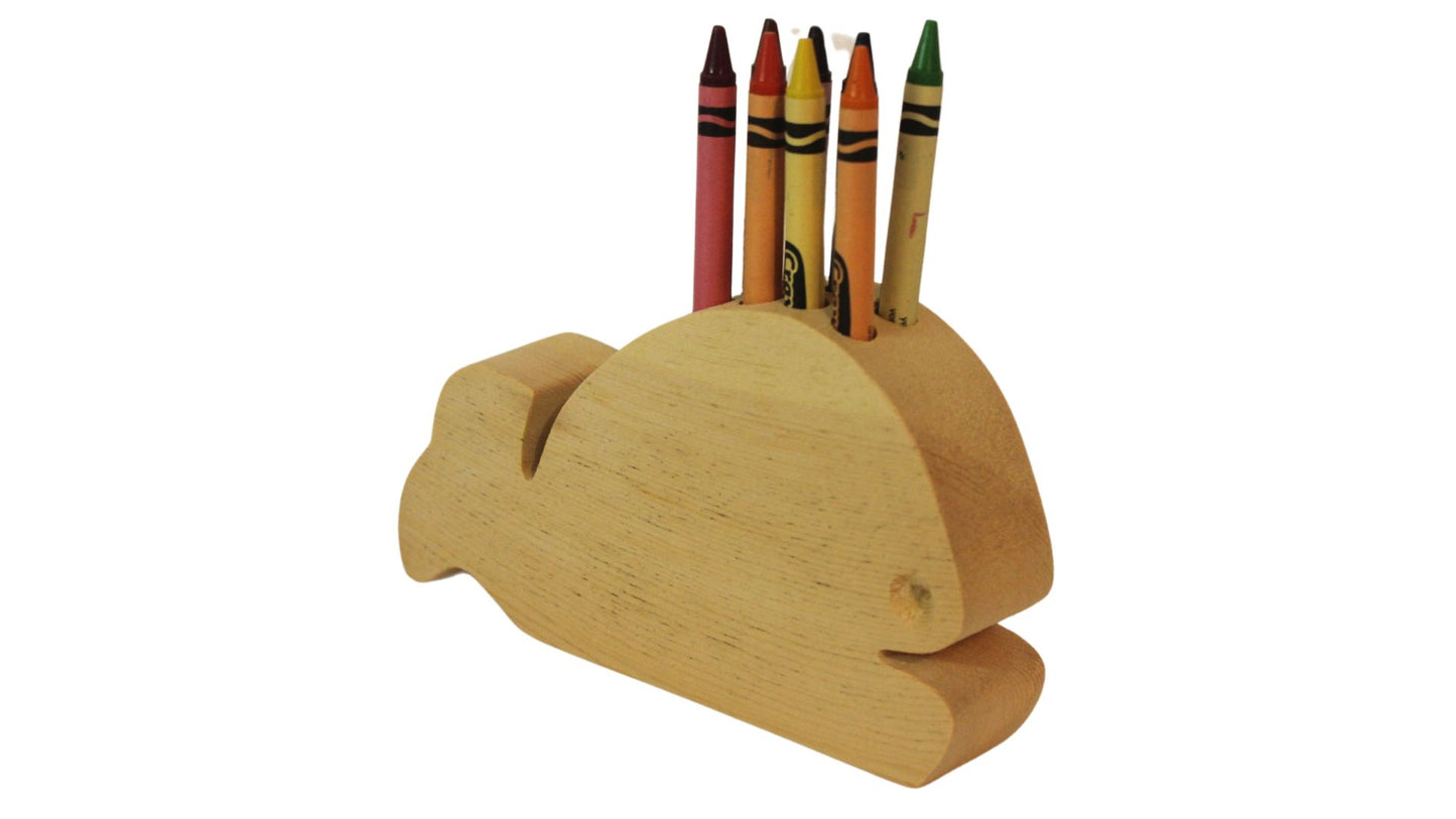 Whale crayon holder with 8 crayons included. Makes a great organizer and pickup incentive once the crayons have been removed from the box