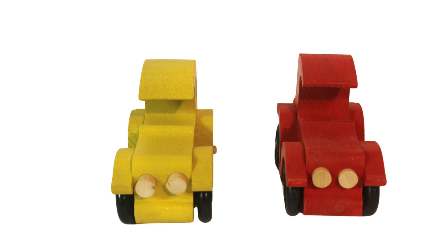 Set of two antique auto toys with spoked wheels, and painted bright red and yellow