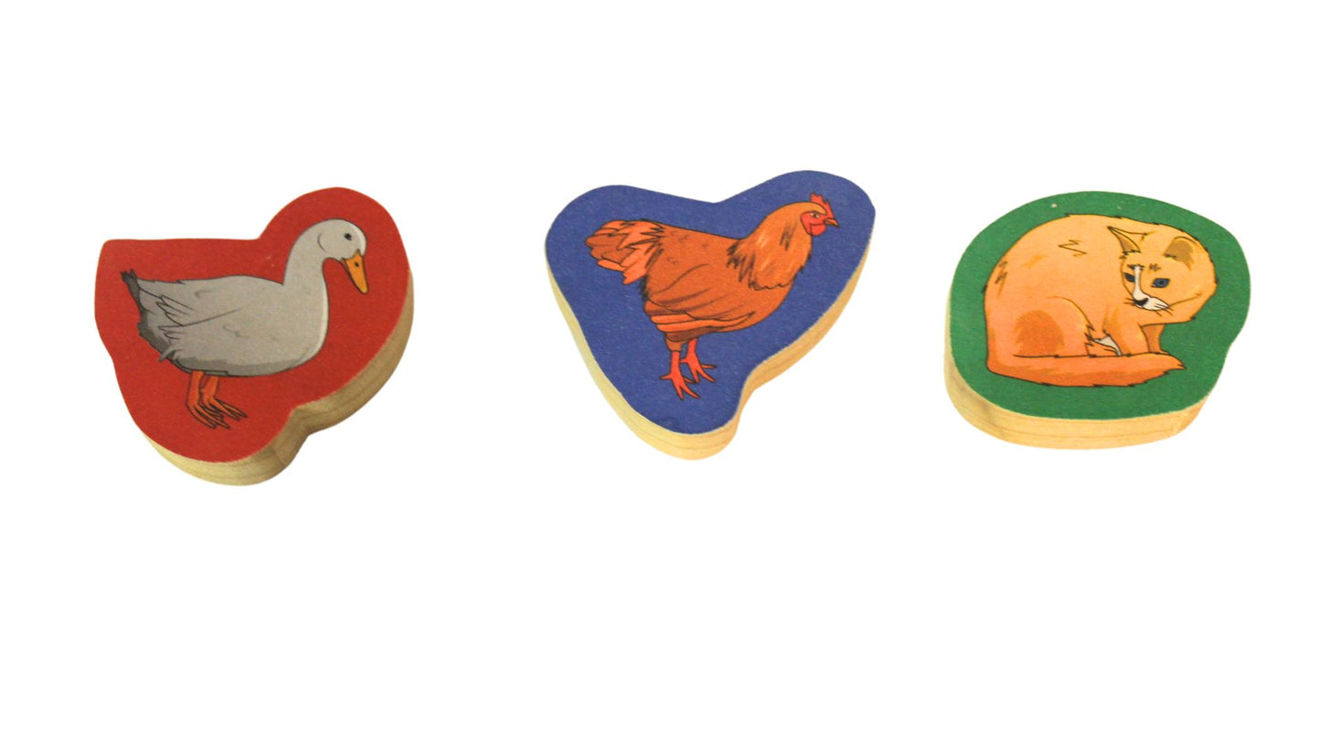 Fun way for a child to learn farm animals: a set of blocks with animal pictures