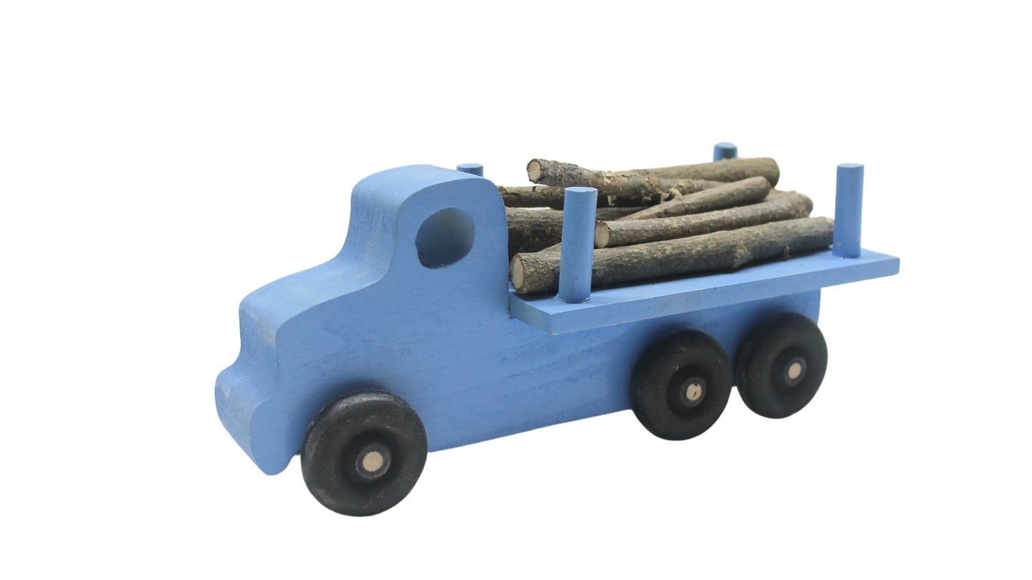 Logging truck, solid poplar, branches to simulate cut trees included. Choice of color