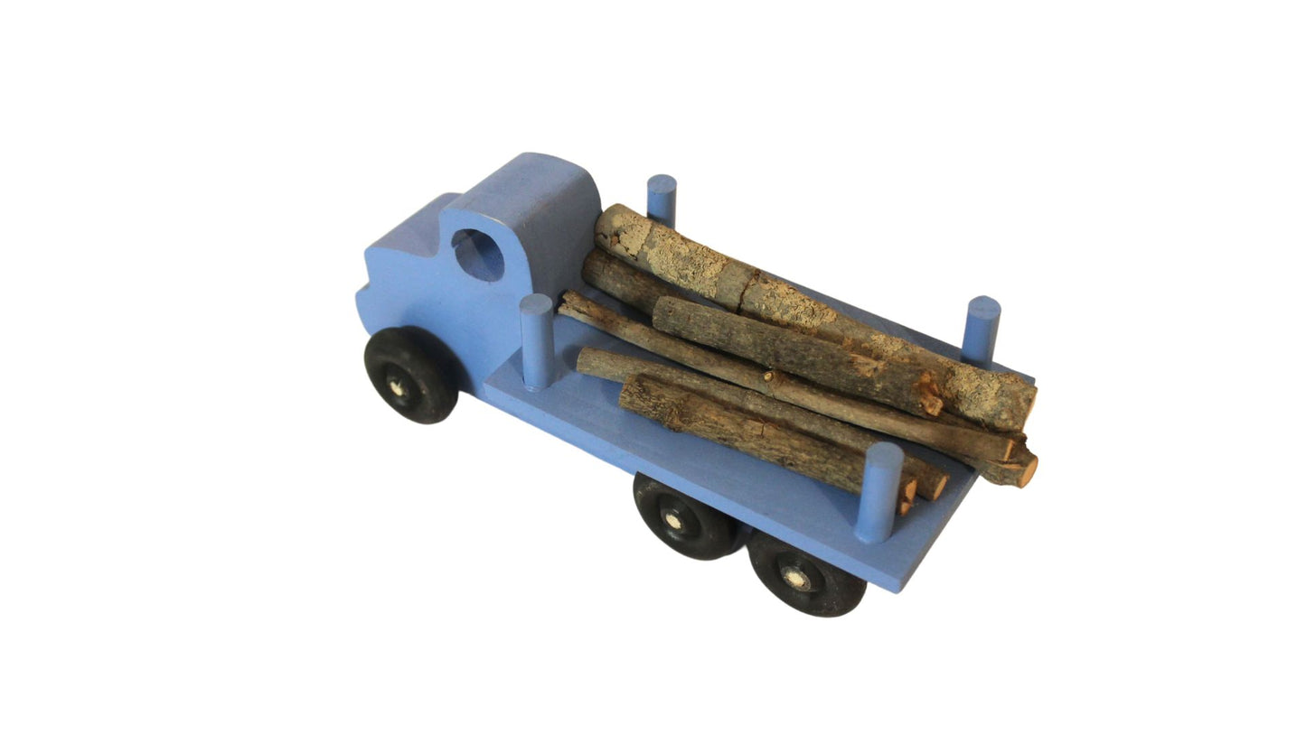Logging truck, solid poplar, branches to simulate cut trees included. Choice of color