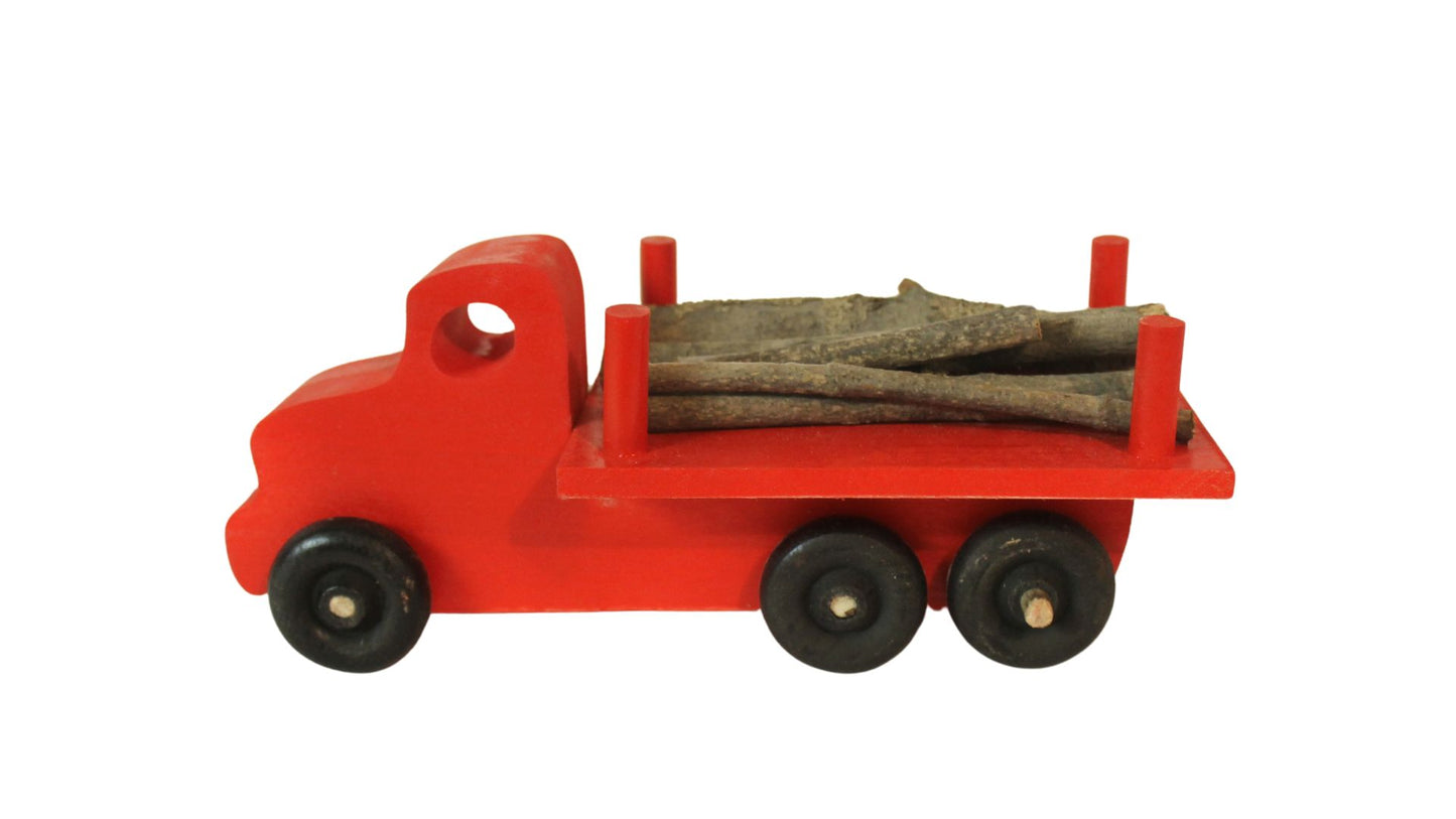 Logging truck, solid poplar, branches to simulate cut trees included. Choice of color