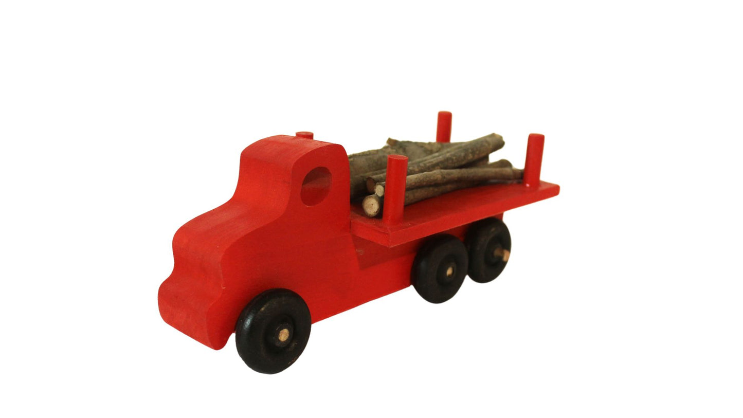 Logging truck, solid poplar, branches to simulate cut trees included. Choice of color