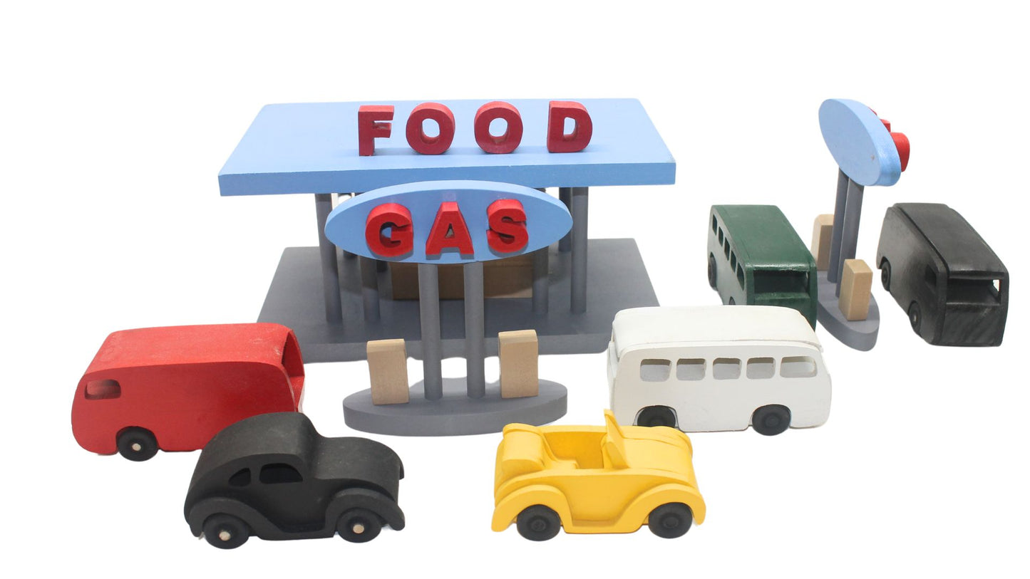 Toy wood gas and food stop with VW vehicles, gas islands, fast food restaurant
