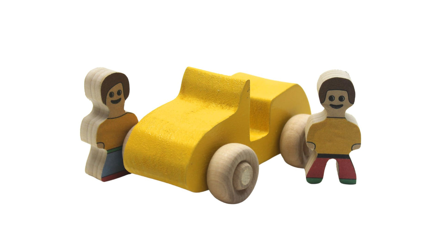Volkswagen car carrier solid wood toy. Set includes a tractor with separate trailer, a VW bug, convertible, and van, and two people