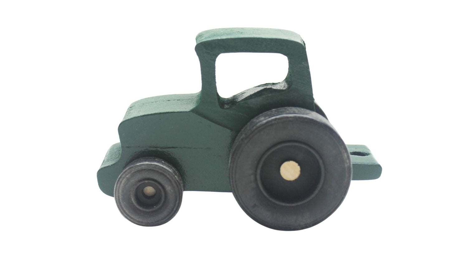 Cattle ranch play set. Includes a tractor pulling a wagon, hay bales, fence sections, cows and calves