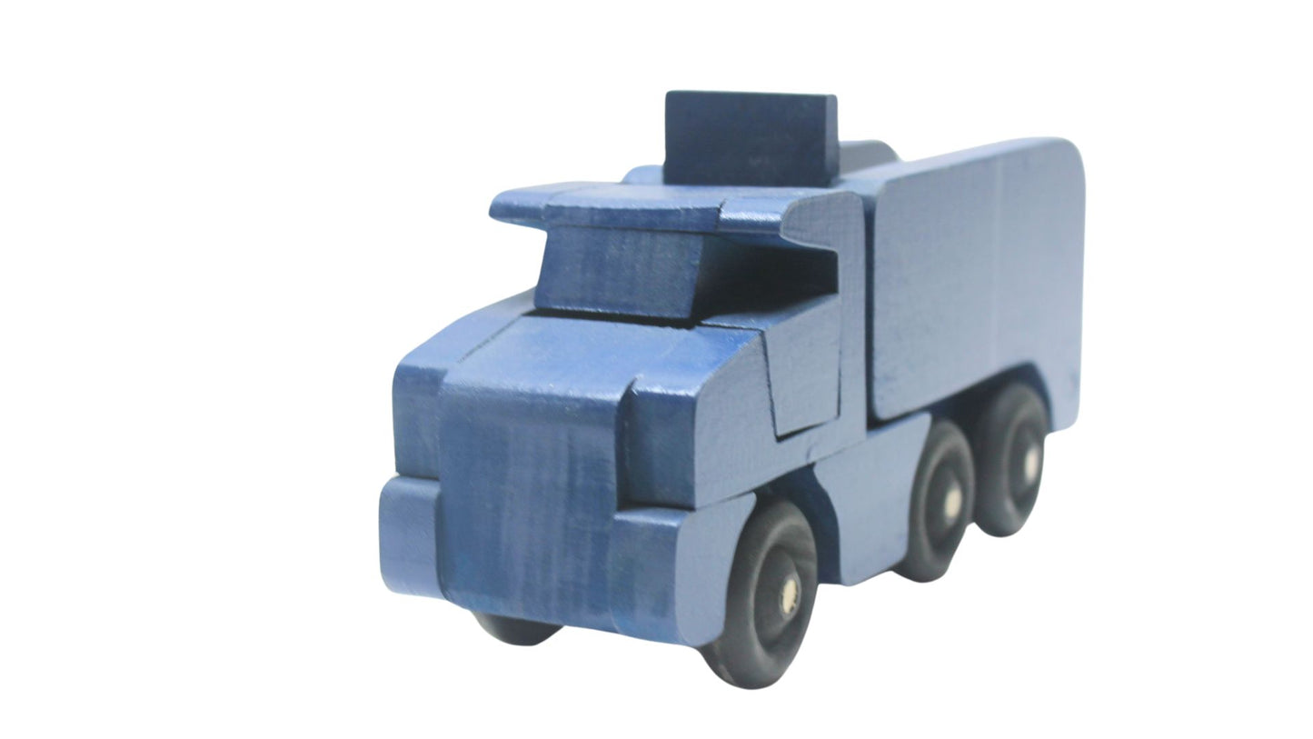 Toy wooden dump truck. What is more fun than a dump truck? Tilting bed, comes in choice of colors