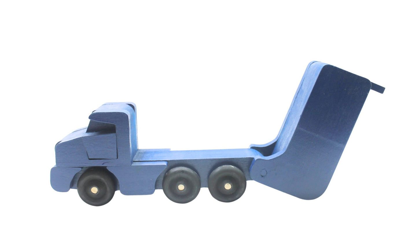 Toy wooden dump truck. What is more fun than a dump truck? Tilting bed, comes in choice of colors