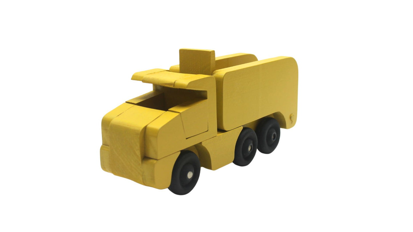 Toy wooden dump truck. What is more fun than a dump truck? Tilting bed, comes in choice of colors