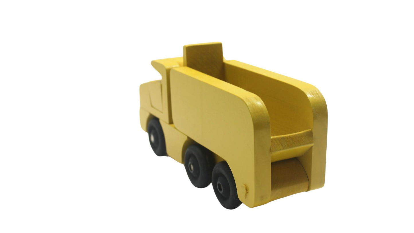 Toy wooden dump truck. What is more fun than a dump truck? Tilting bed, comes in choice of colors