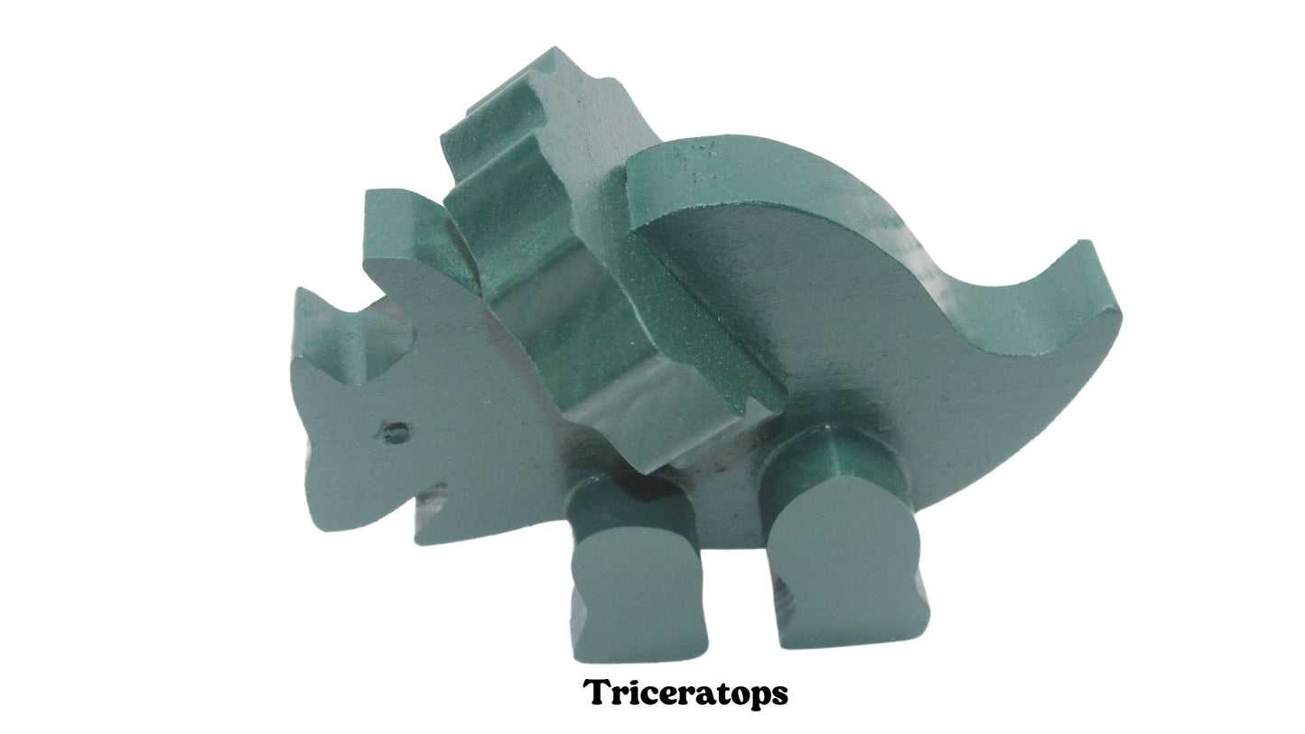 Dinosaurs: choose from a brontosaurus, triceratops, pterodactyl, tyrannosaurus rex, or stegosaurus. Solid wood; choice of oak, or painted green
