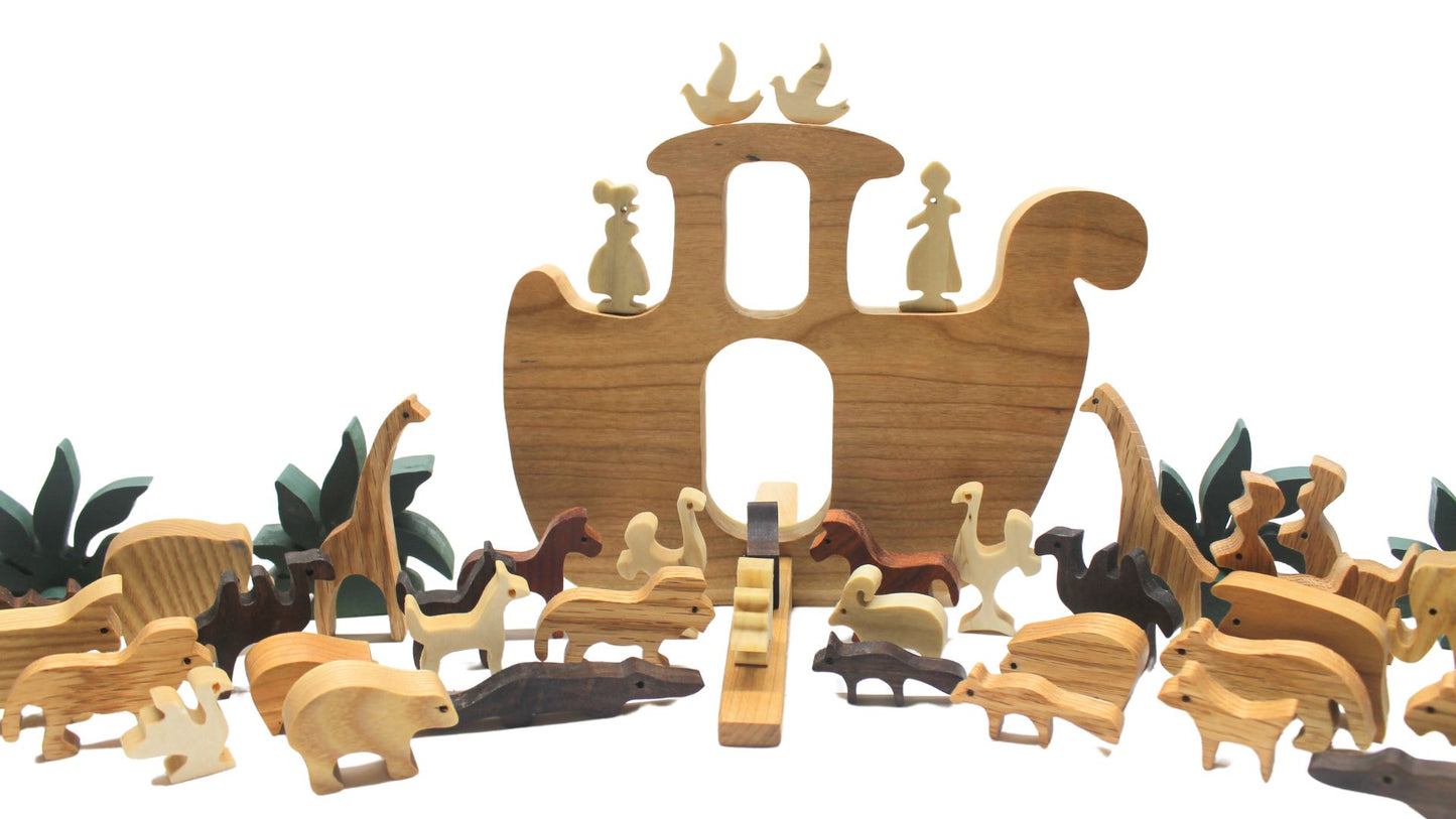 Noah's animal ark, pairs of animals made from various hardwoods. Choice of oak,cherry or walnut for ark and removable ramp