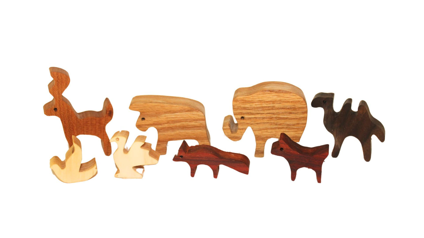 Noah's animal ark, pairs of animals made from various hardwoods. Choice of oak,cherry or walnut for ark and removable ramp