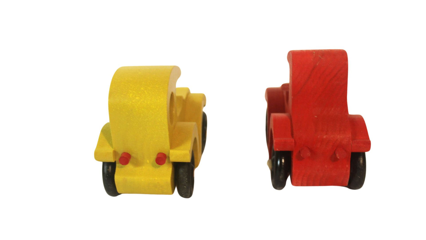 Set of two antique auto toys with spoked wheels, and painted bright red and yellow