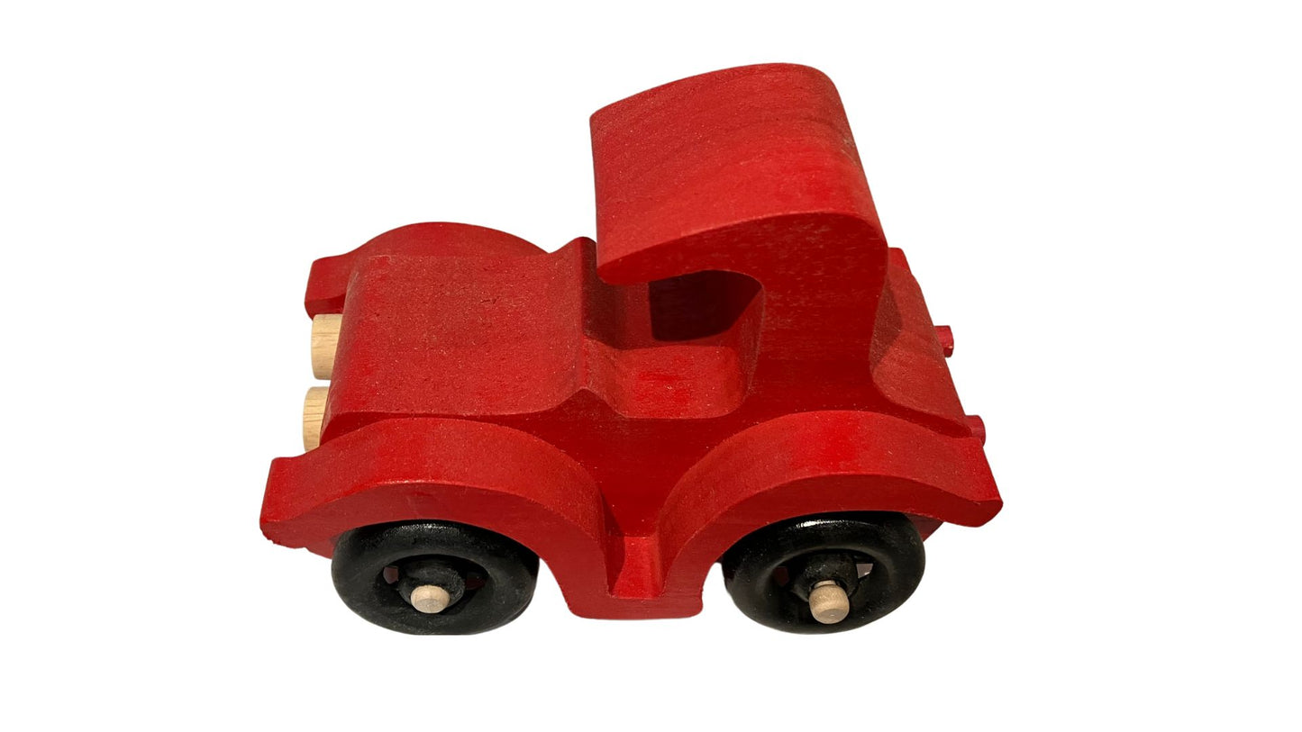 Set of two antique auto toys with spoked wheels, and painted bright red and yellow