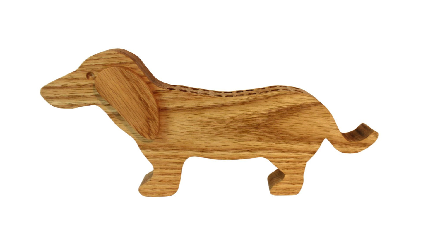 Dachshund shaped crayon holder. This cute holder provides a motivation for a child to put their crayons away