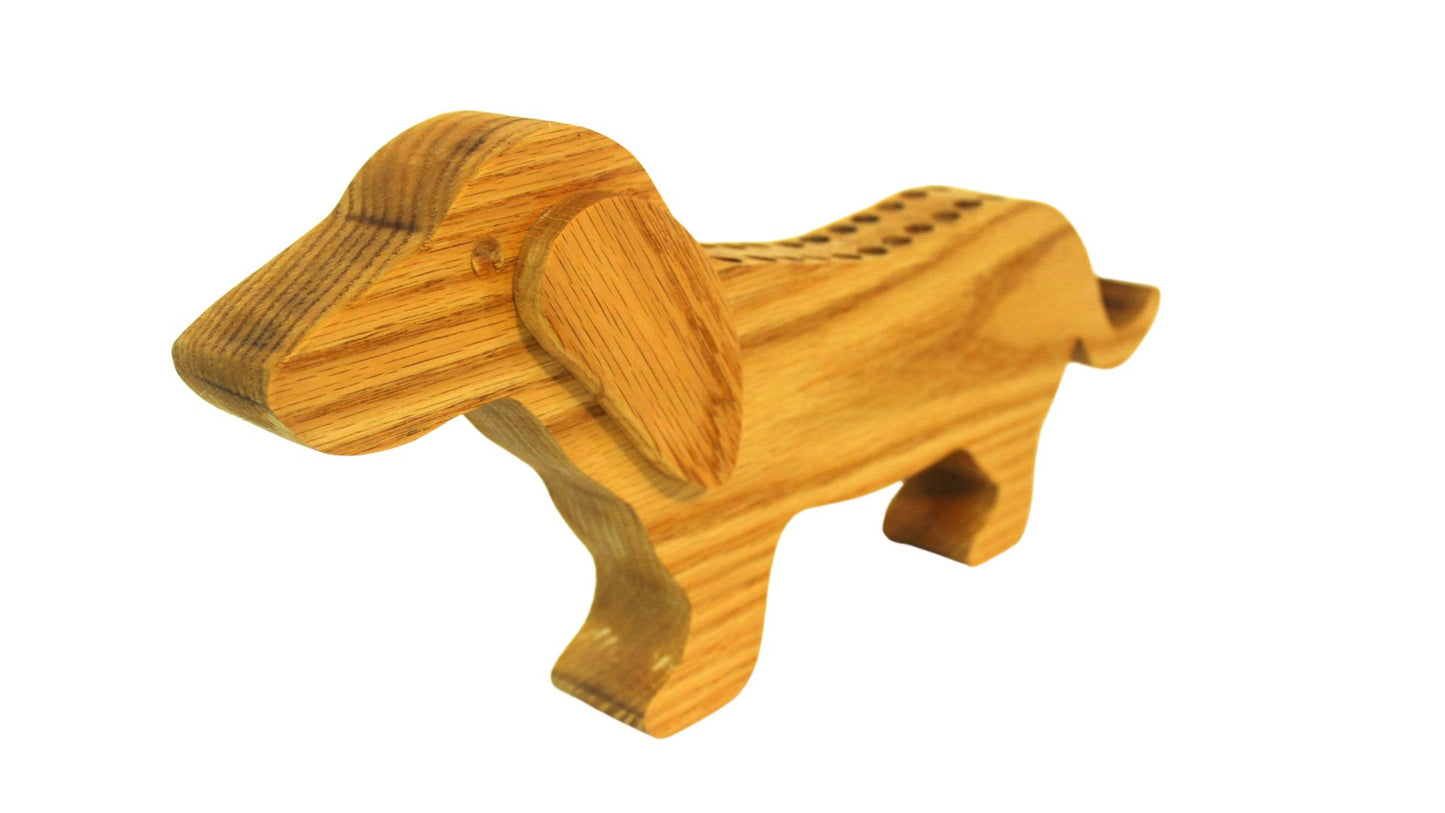 Dachshund shaped crayon holder. This cute holder provides a motivation for a child to put their crayons away