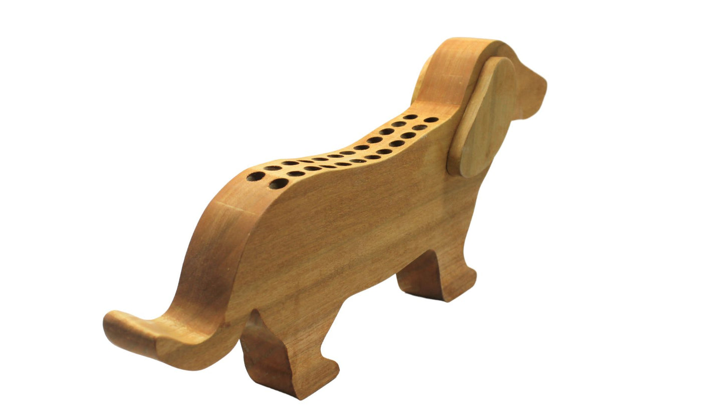 Dachshund shaped crayon holder. This cute holder provides a motivation for a child to put their crayons away