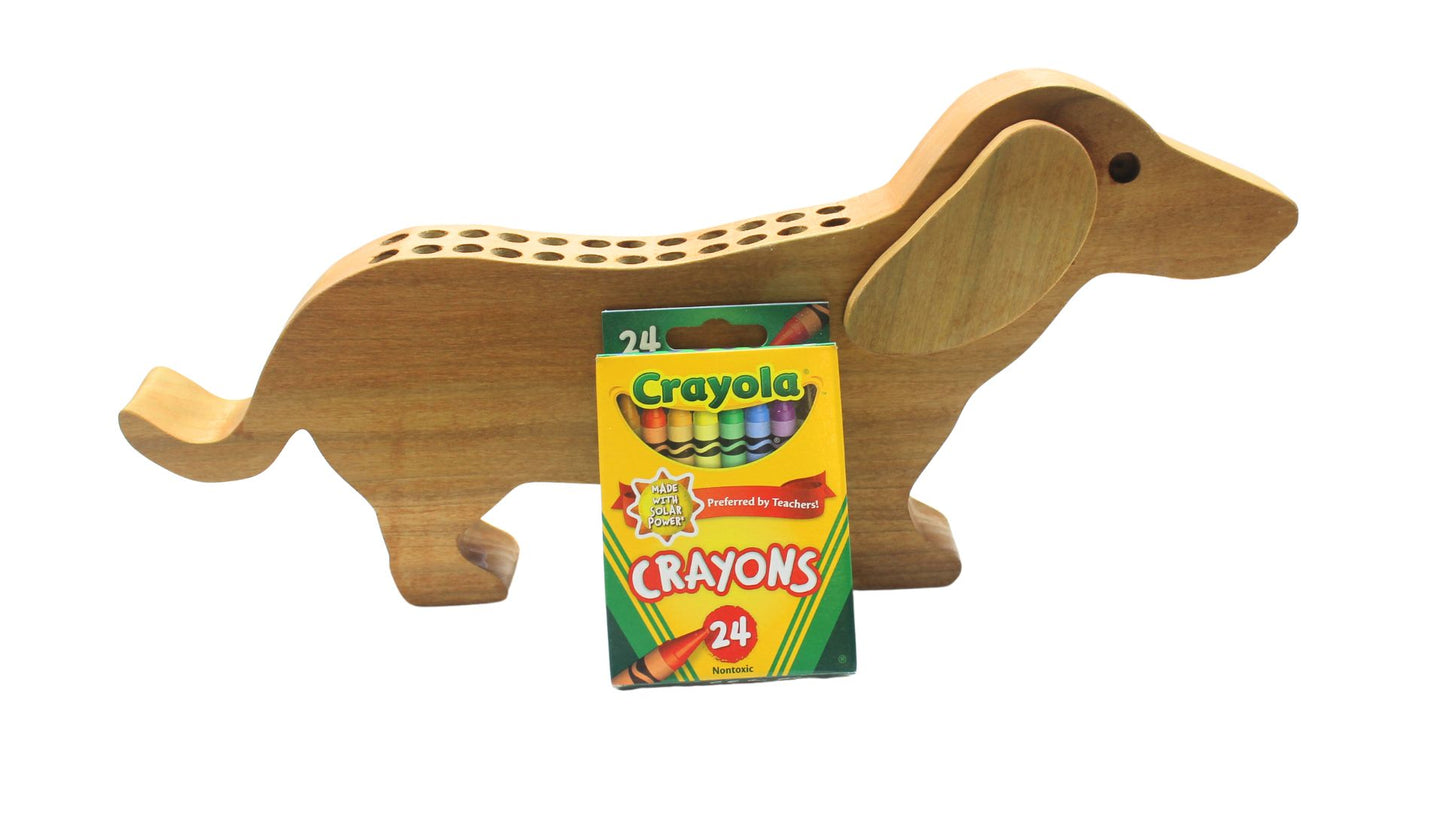 Dachshund shaped crayon holder. This cute holder provides a motivation for a child to put their crayons away