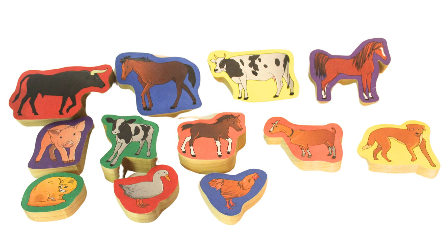 Fun way for a child to learn farm animals: a set of blocks with animal pictures