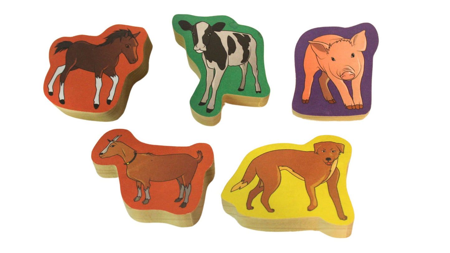 Fun way for a child to learn farm animals: a set of blocks with animal pictures