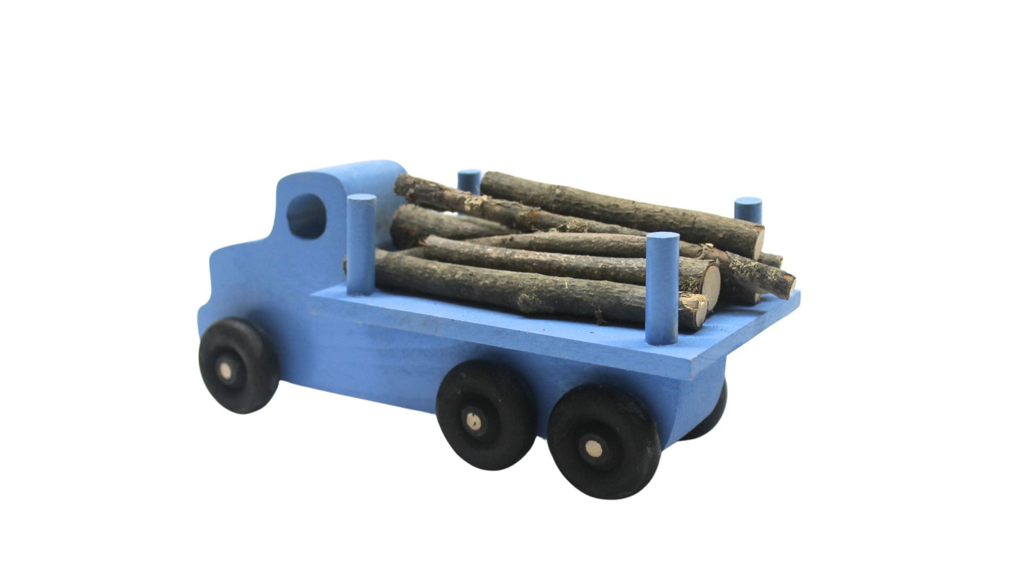 Logging truck, solid poplar, branches to simulate cut trees included. Choice of color
