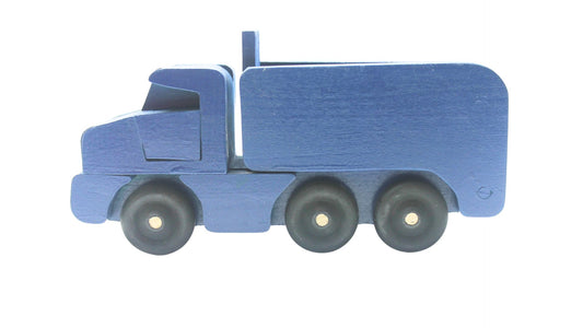 Toy wooden dump truck. What is more fun than a dump truck? Tilting bed, comes in choice of colors