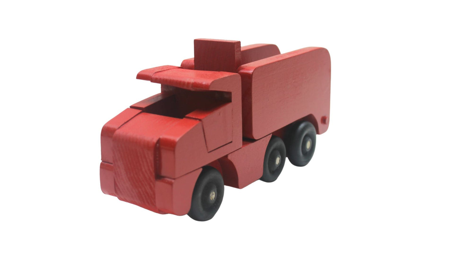 Toy wooden dump truck. What is more fun than a dump truck? Tilting bed, comes in choice of colors