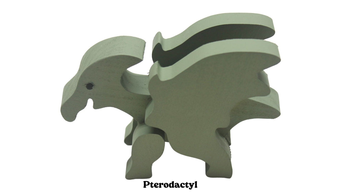 Dinosaurs: choose from a brontosaurus, triceratops, pterodactyl, tyrannosaurus rex, or stegosaurus. Solid wood; choice of oak, or painted green