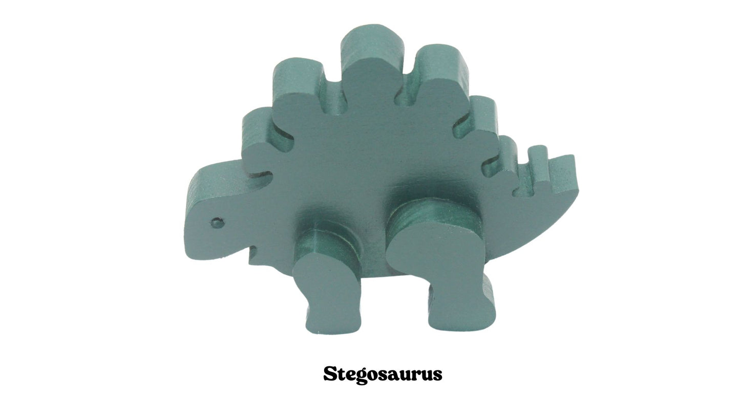 Dinosaurs: choose from a brontosaurus, triceratops, pterodactyl, tyrannosaurus rex, or stegosaurus. Solid wood; choice of oak, or painted green