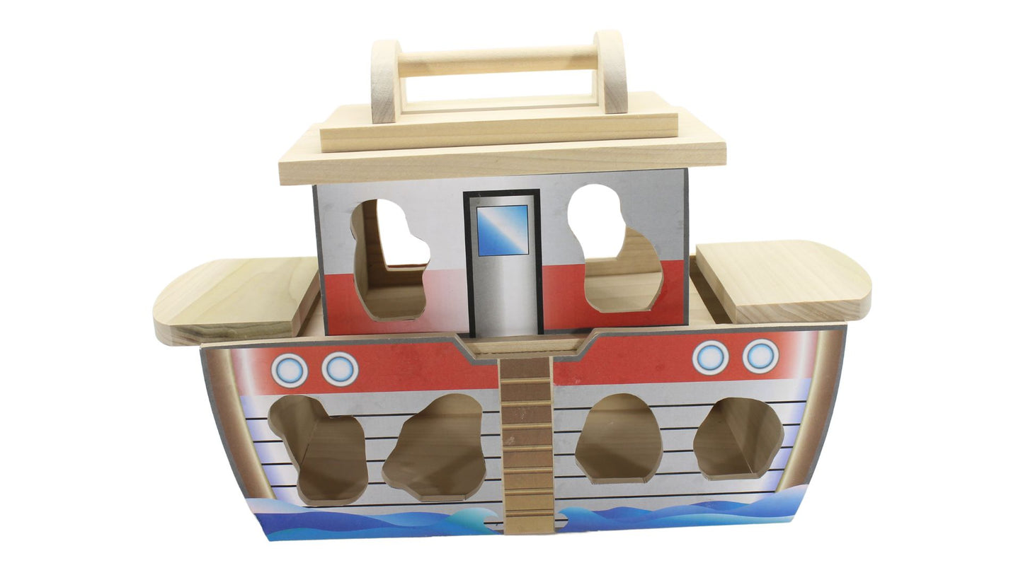 Noah's ark with removable top for storage. Holes are cut in the sides so children can learn irregular shapes by placing animals in them.